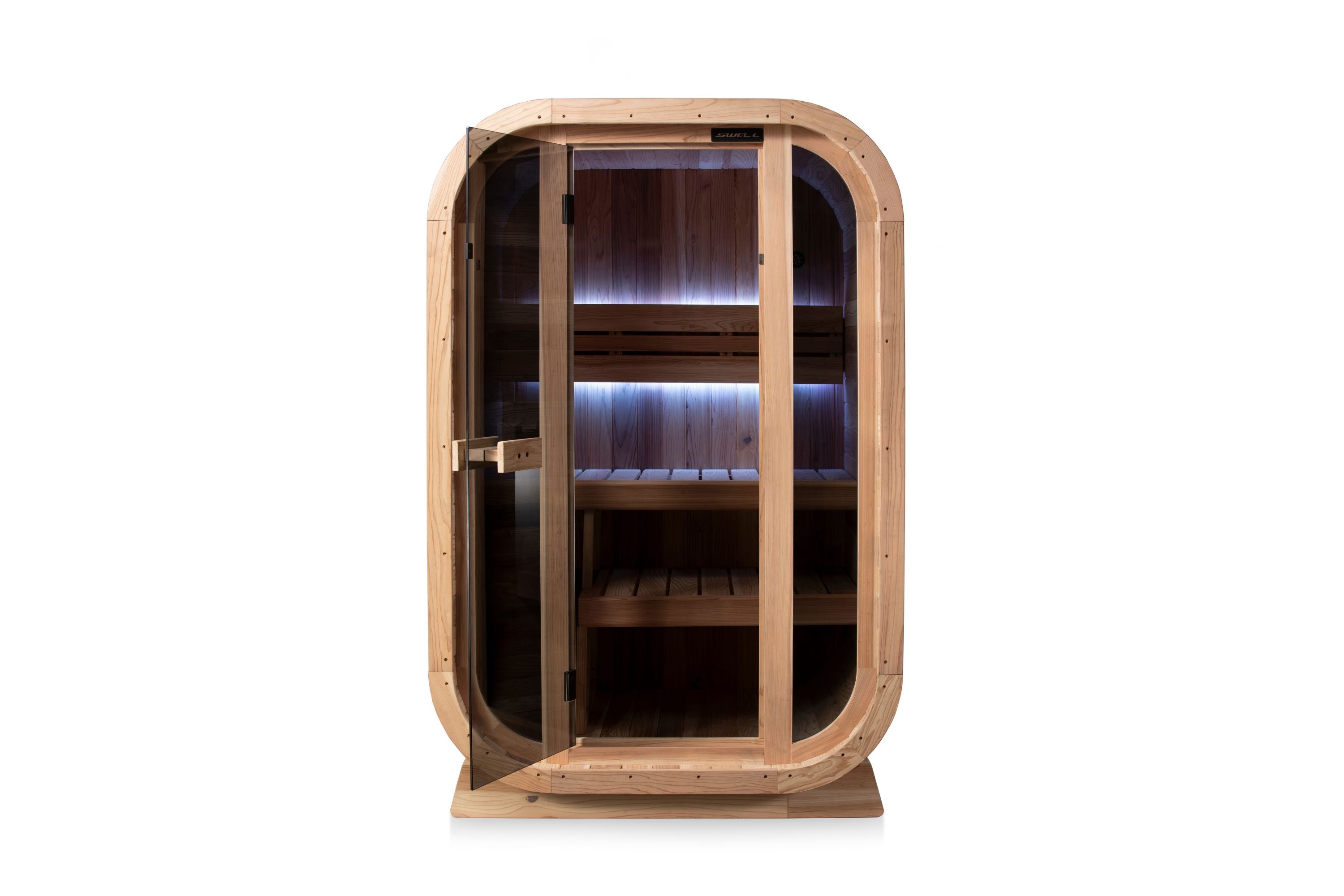 Front view of a Swell Cedar Cube 2 glass-front sauna with purple interior lighting